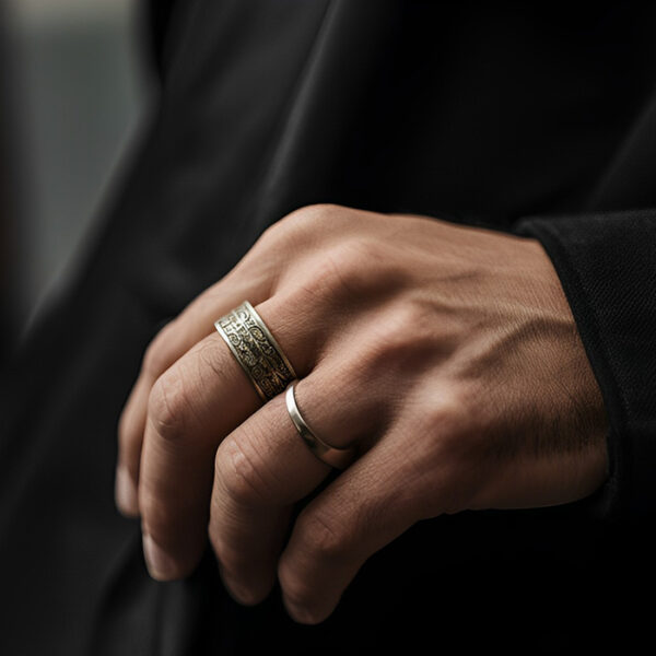 rings on man's hand