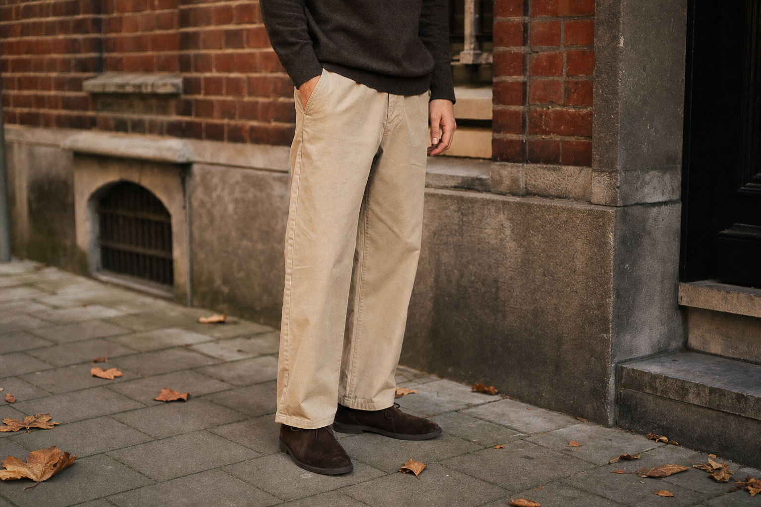 man wearing wide leg trousers with chukka boots